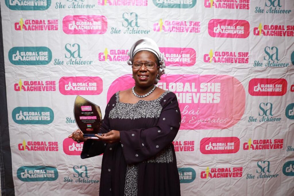 Fatou Saine Gaye Recieving Award